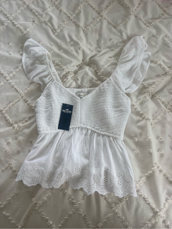 Hollister Tops - Hollister White Eyelet Smocked Peplum Camisole